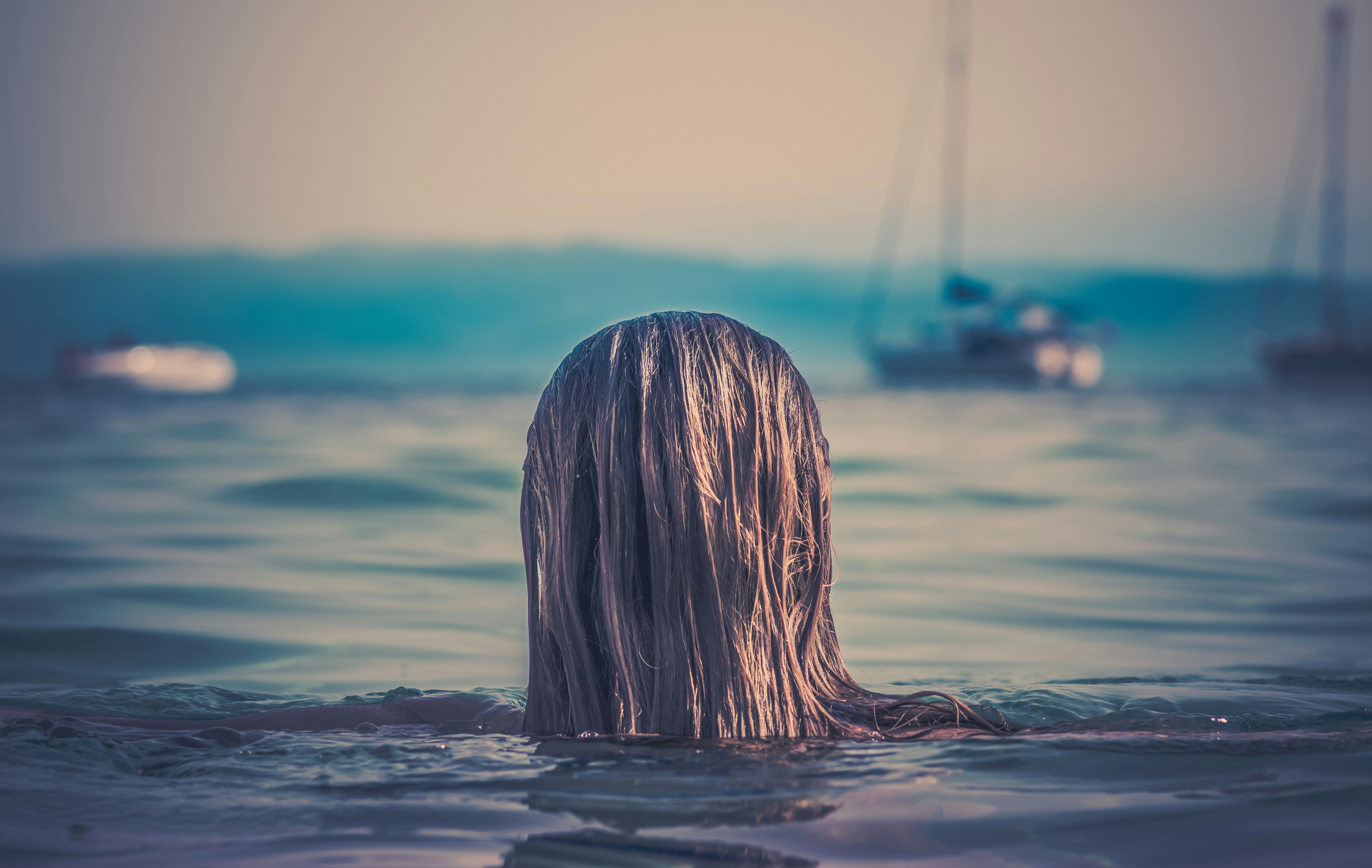 selective focus photo of woman's head